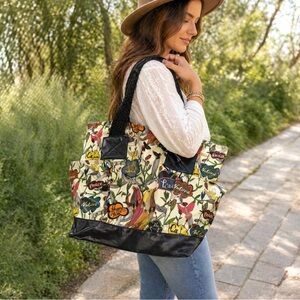 The Sakroots Artist Circle Tote Peace Birds Boho Coated Canvas Large Bag